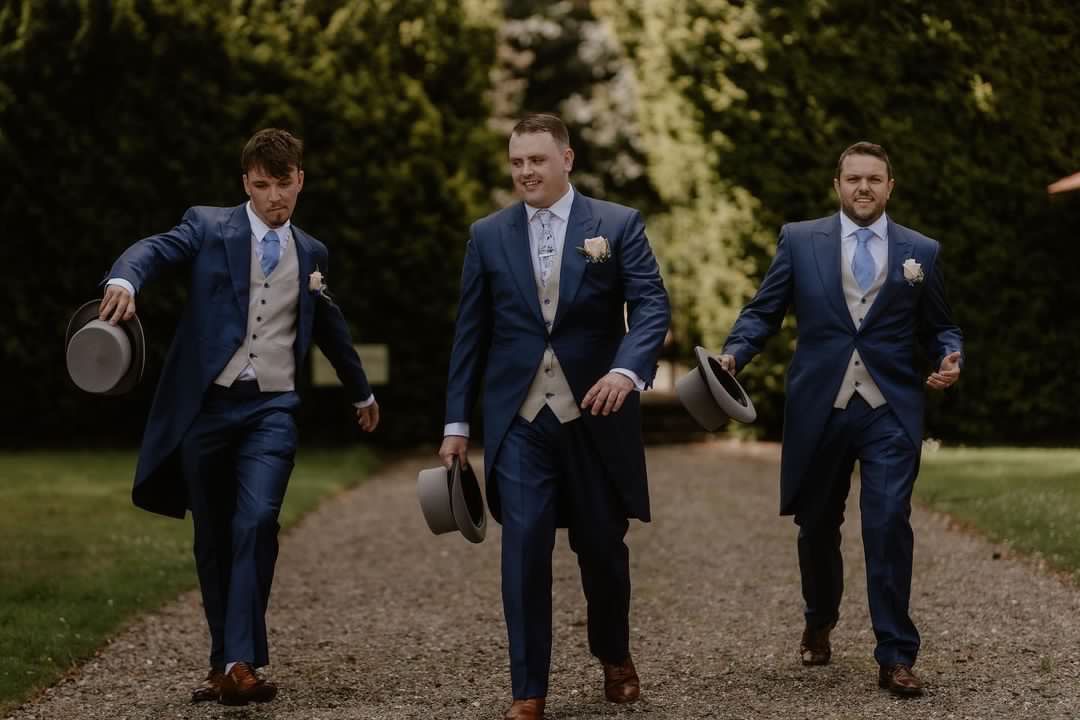 Herringbone Tails Navy Suit On Wedding Day