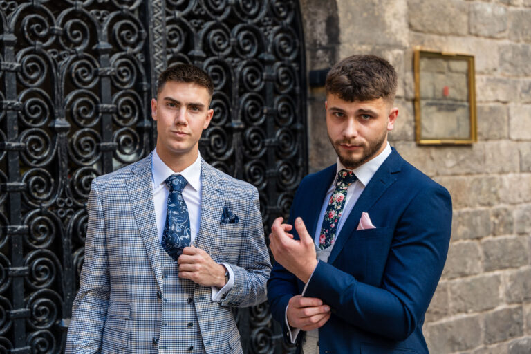 Two men wearing suit